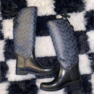 Women’s Leather Coach Boots with Lace up Bow details on the back.